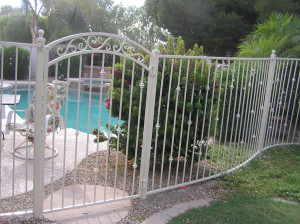 White iron pool fence